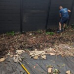 digging landscaping garden for patio flags