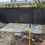 fence cleaning up patio flags garden trees